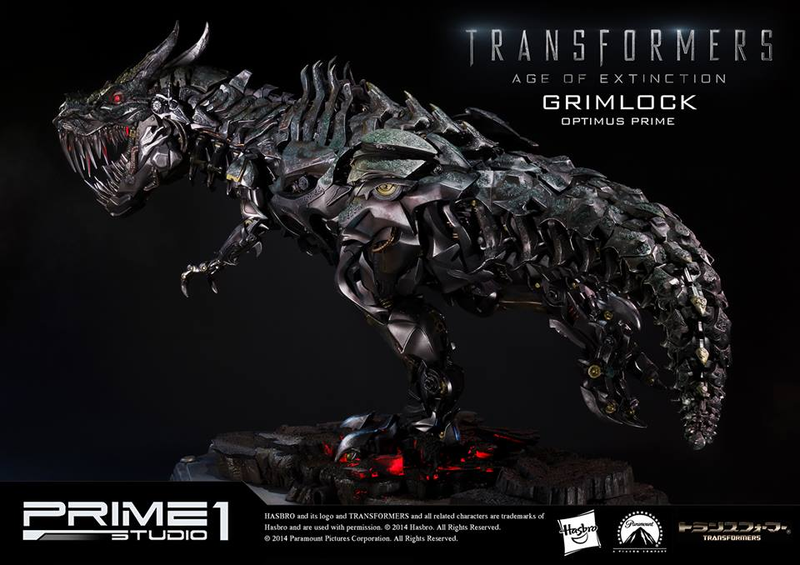 Illustration for article titled Glorious Grimlock and Optimus Prime Statue